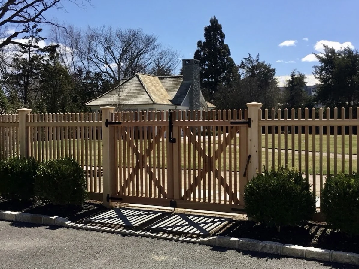 Custom cedar fence with X-braced double gate in Southampton, NY