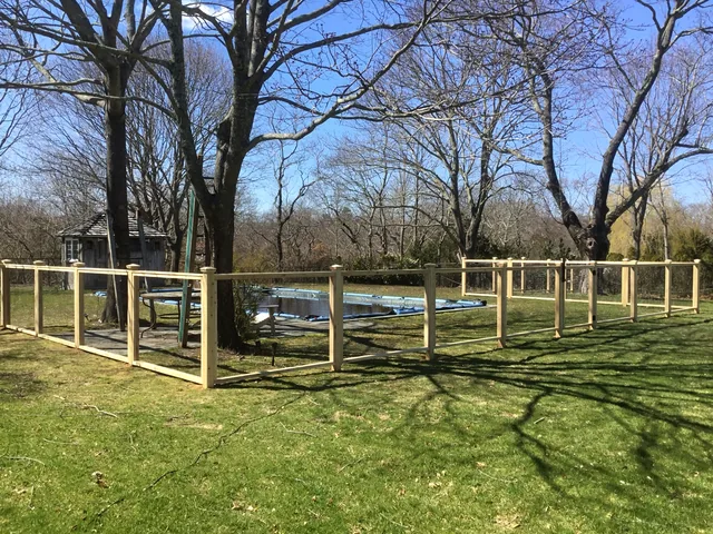 Custom Cedar Framed Wire Pool Fence in Center Moriches, New York