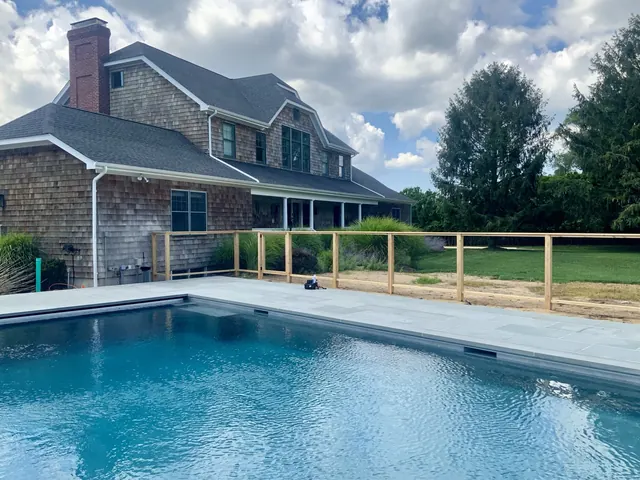 Custom Cedar Framed Wire Pool Fence in Westhampton, New York
