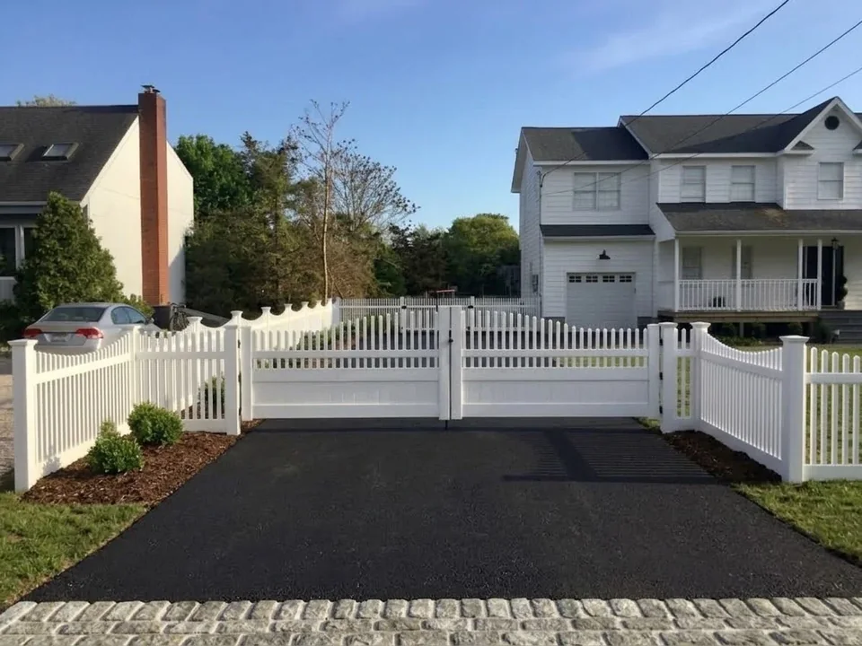 Custom 16-foot reinforced PVC driveway gates in Hampton Bays, New York