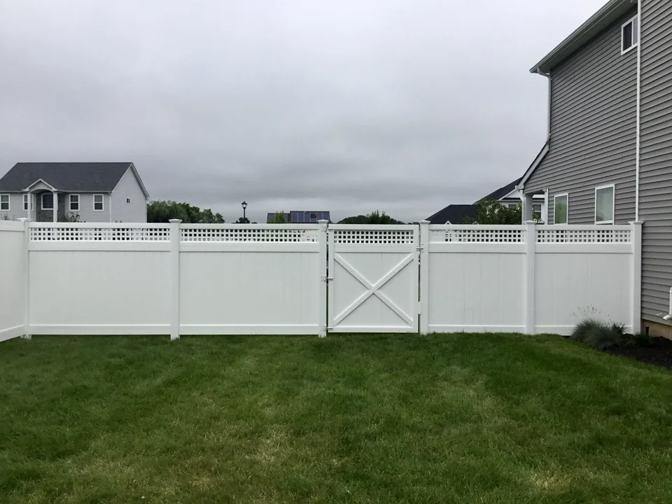 White PVC square lattice-top walk gate in Wading River, New York